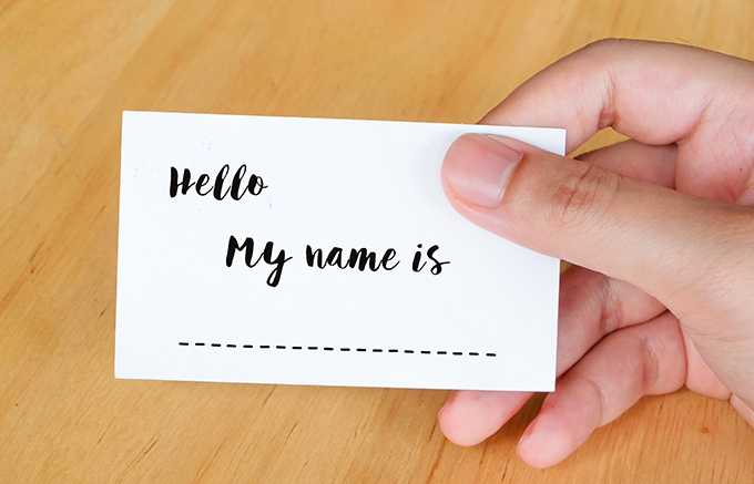 Hello my name is words on name card background